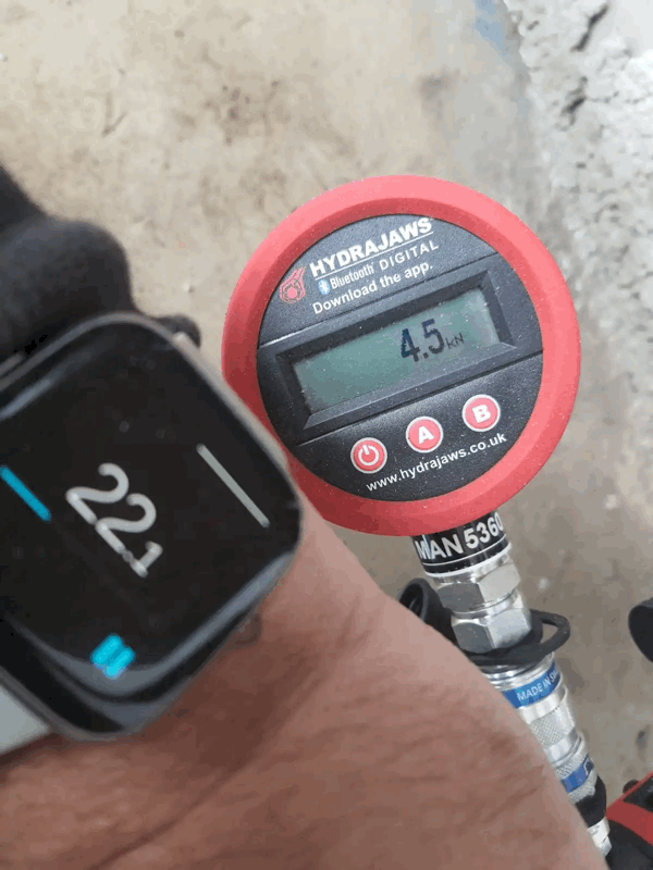 Hydrajaws digital gauge reading 4.5kN during a pull out test on a cladding fixing anchor